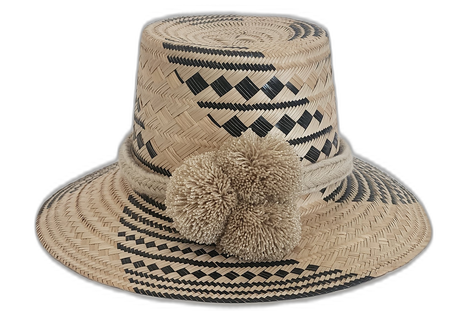Handmade Wayuu straw hat in black and natural with beige pompoms