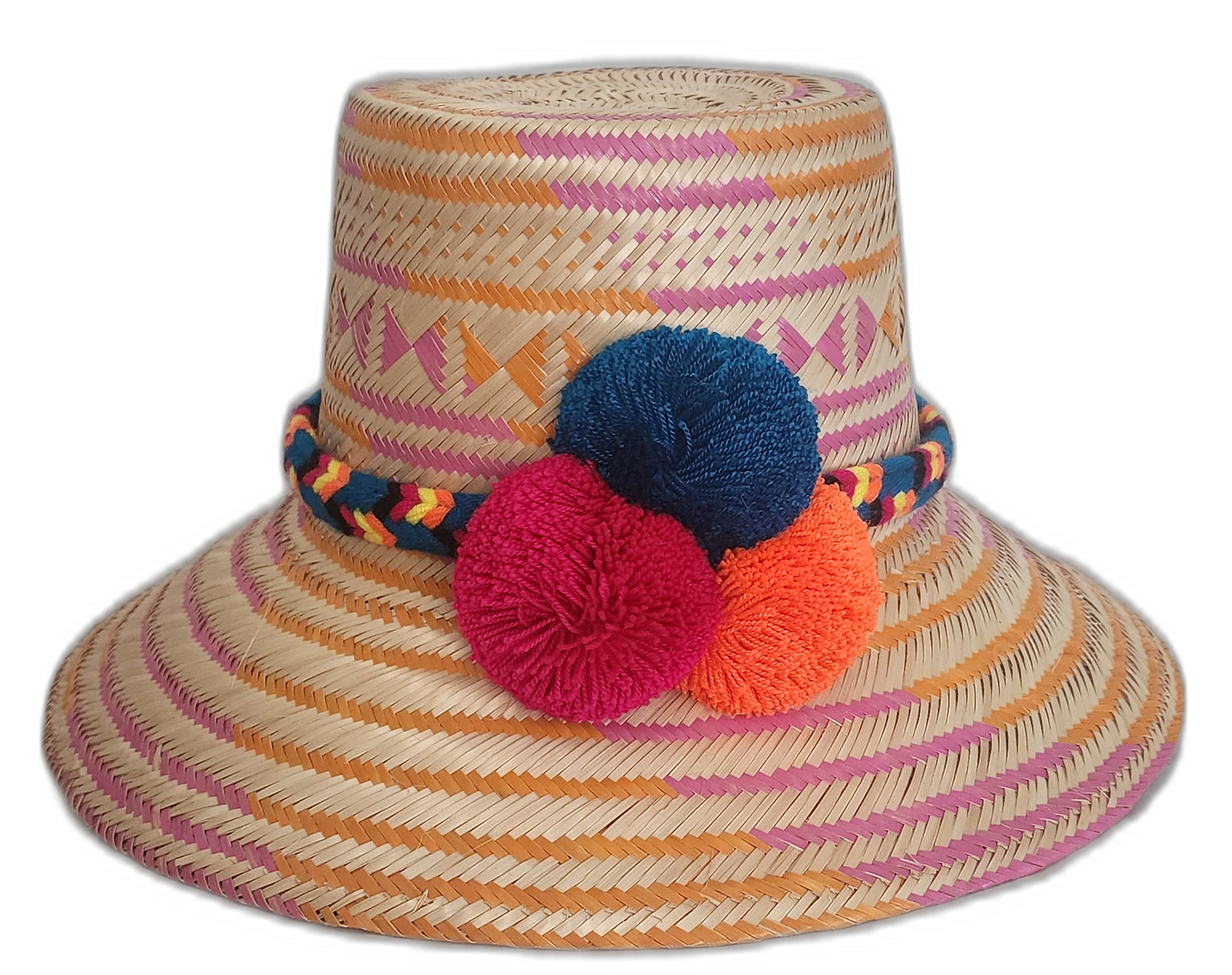 Handmade Wayuu straw hat with pink, orange, and natural weave featuring blue, fuchsia, and orange pompoms.