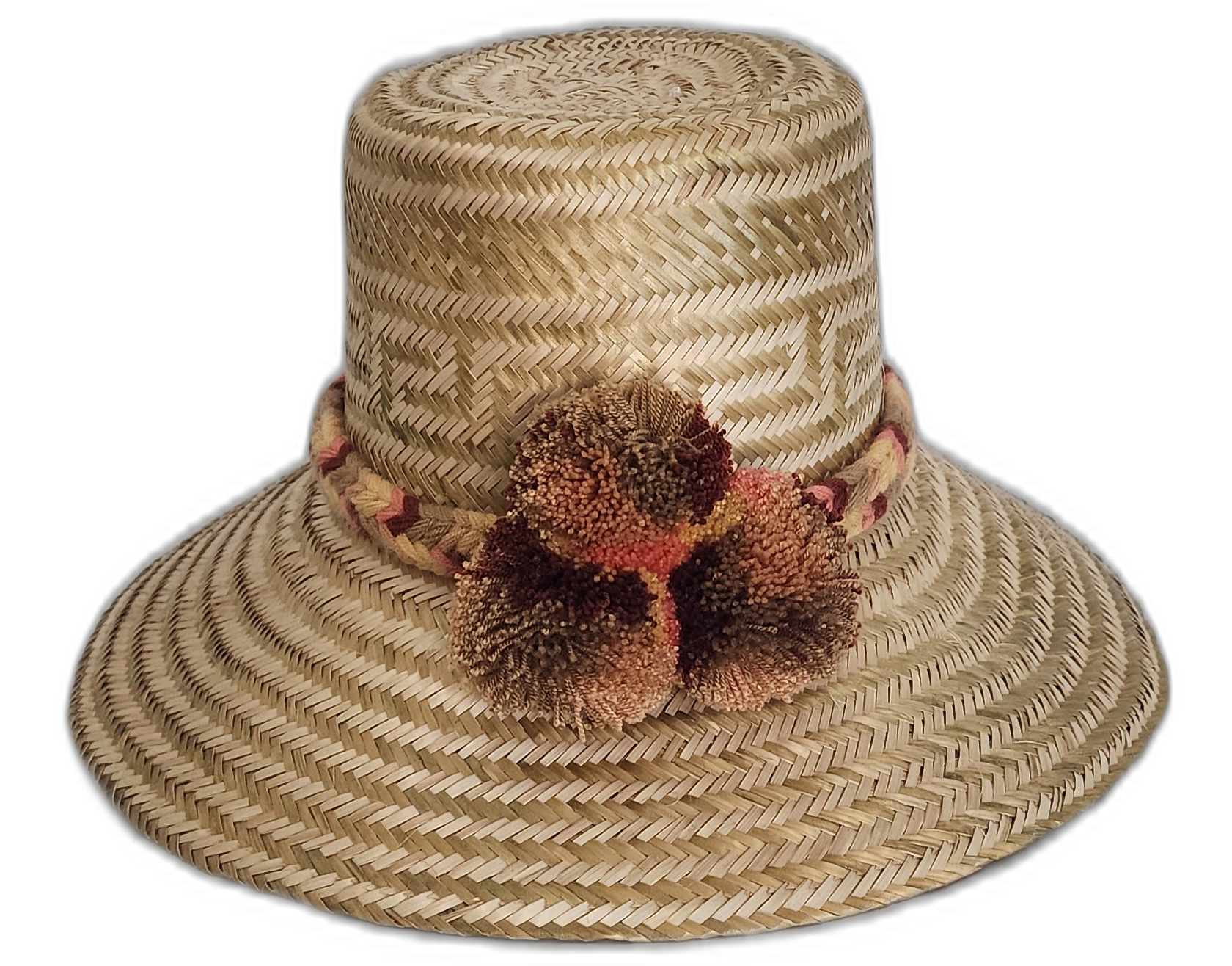 Boho straw hat with geometric pattern and artisan caramel-toned pompoms

