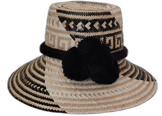 Handmade Wayuu bohemian straw hat in black and natural tones with black pompoms

