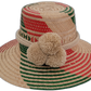 Rachel handmade Wayuu straw hat with red and green geometric weave and beige pompoms

