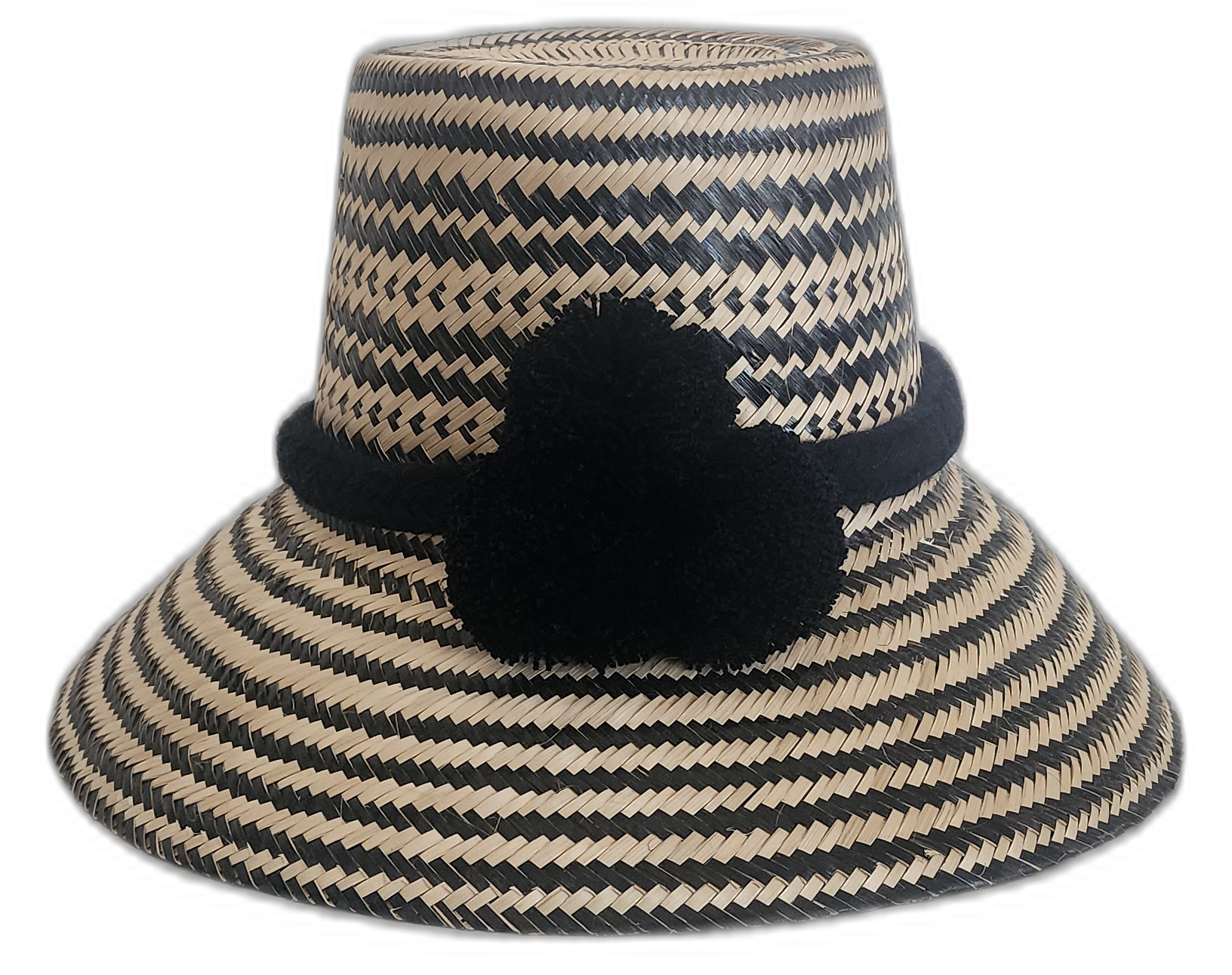 Handmade Wayuu straw hat in black and natural with decorative pompoms