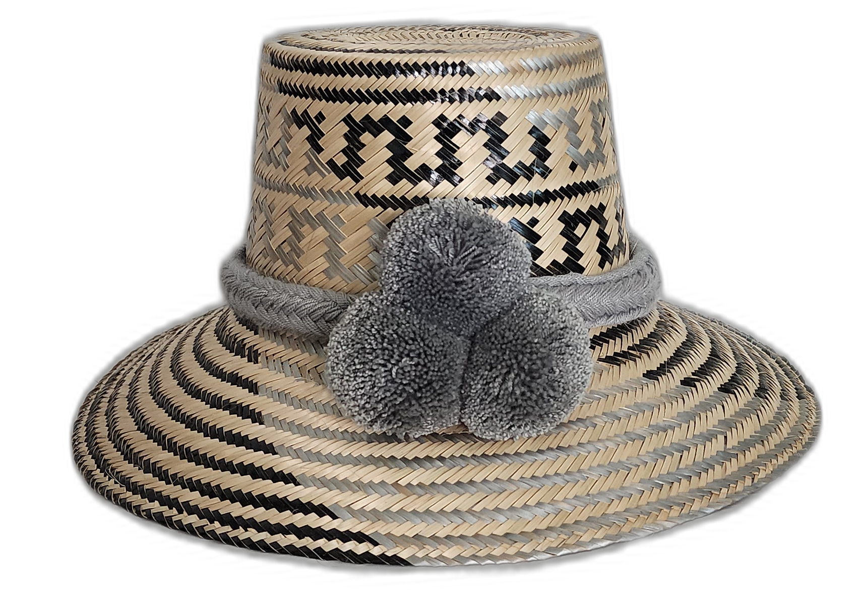 Handmade Wayuu straw hat in grey and black with matching grey pompoms.Bohemian artisan hat with soft gray pompom trio and handcrafted weave

