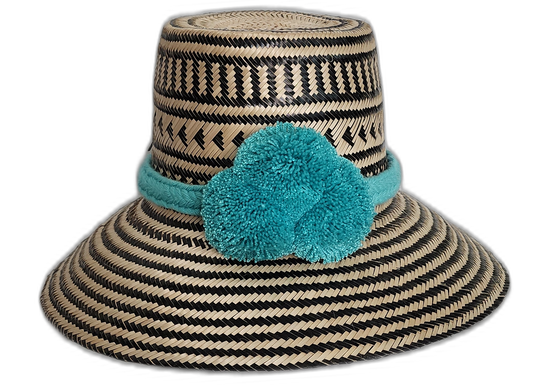 Handmade Wayuu straw hat with black weave and turquoise pompoms.Rose handmade Wayuu hat with black stripe pattern and turquoise pompoms