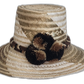 Minimalist boho hat in natural straw with soft earthy tones and handcrafted pompom accents

