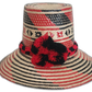 Bohemian straw hat with red and black geometric weave and handcrafted details

