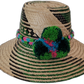 Sawyer handmade Wayuu hat with green and black geometric weave and vibrant pompoms

