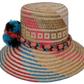 Bohemian straw hat Selena featuring colorful Iraca palm and vibrant cultural pompoms

