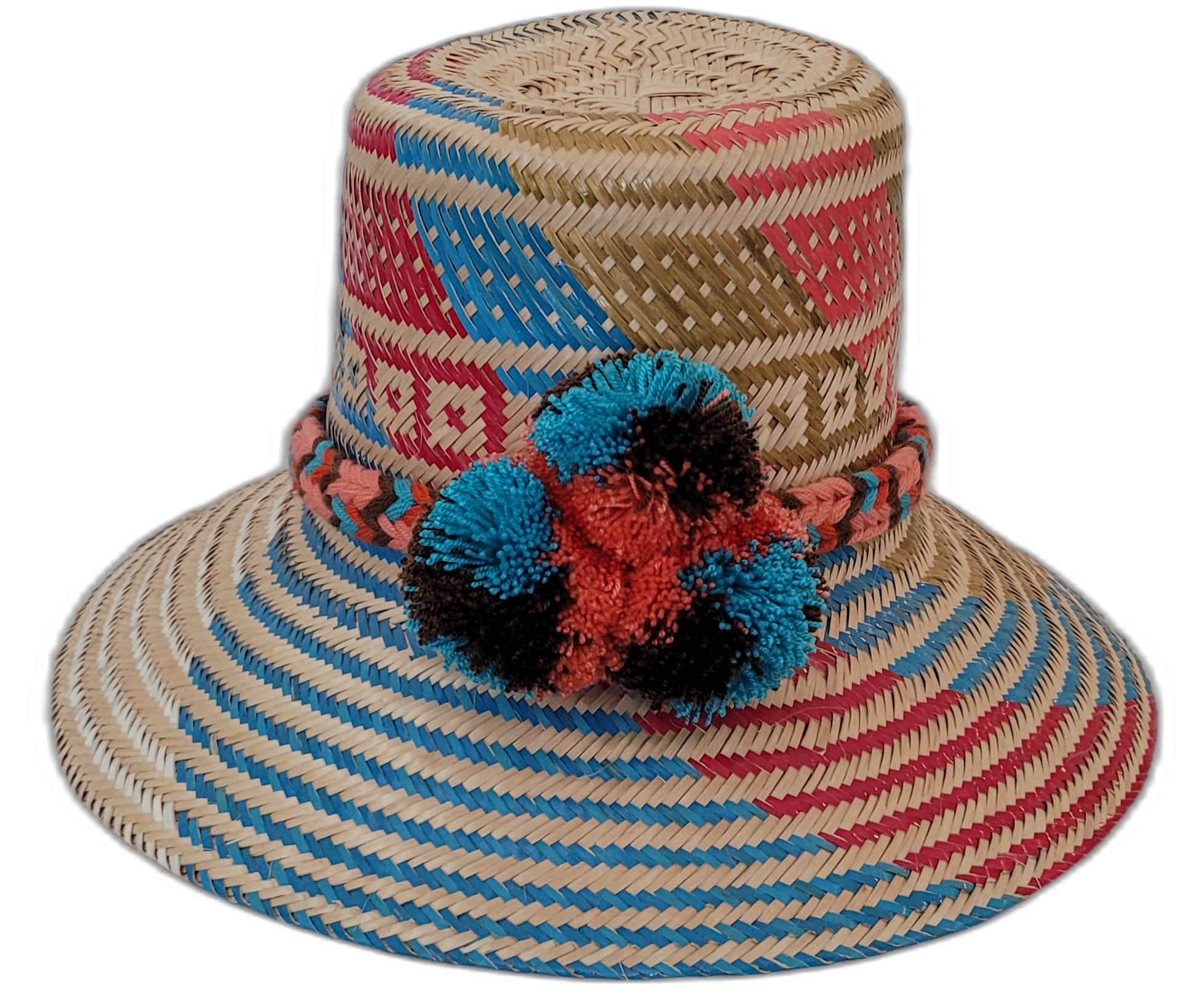 Selena handmade Wayuu hat with natural, red, blue, and black palm weave and pompoms

