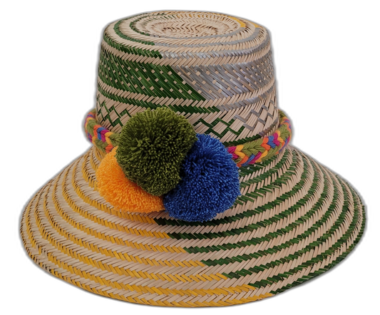 Sevyn handmade Wayuu hat with natural palm weave in green and yellow and bold pompoms


