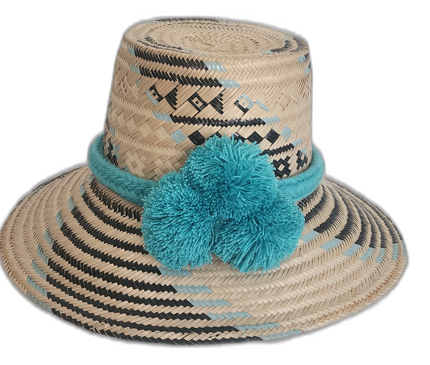 Handmade Wayuu straw hat with black and sky blue woven pattern and three light blue pompoms. Bohemian artisan hat featuring black and turquoise tribal patterns

