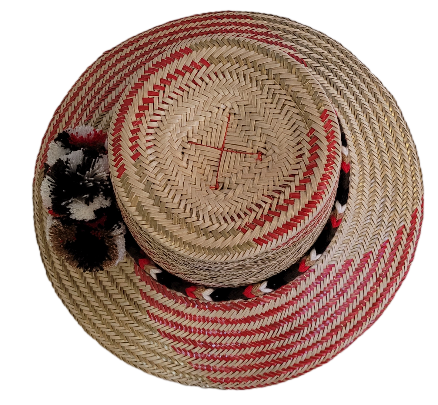 Wayuu bohemian straw hat with bold red accents and traditional pompom decor