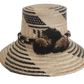 Handcrafted beach straw hat, perfect as a stylish beach hat and loved for its warm weather hat flair.
