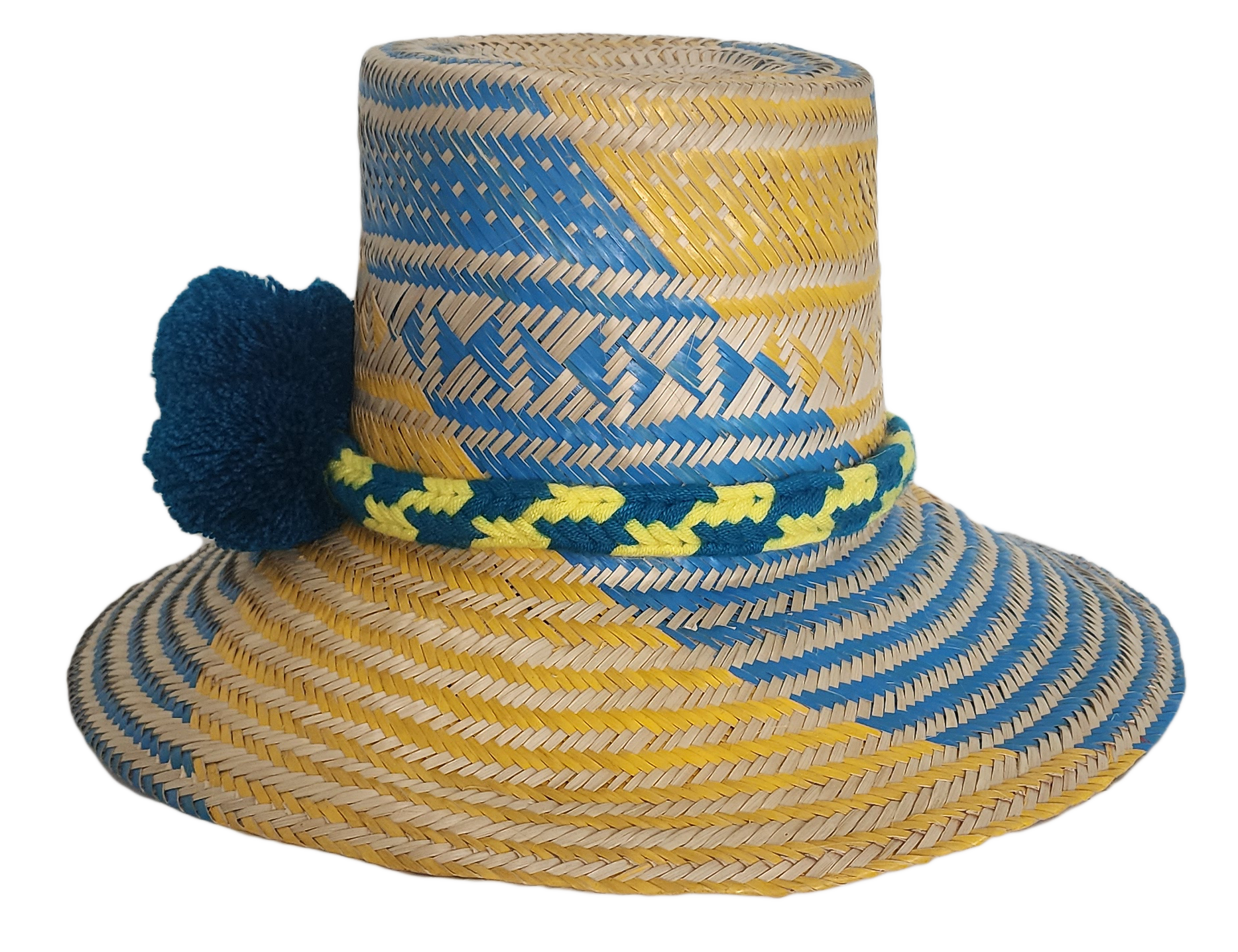 Colorful Wayuu hat in yellow and blue spiral pattern, with artisan pompom detail