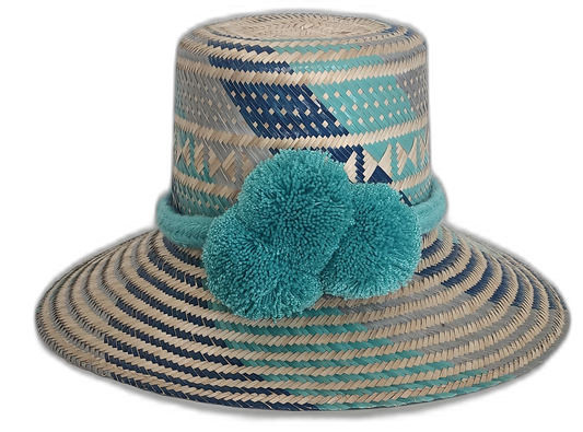 Boho Straw Hat in turquoise and navy with large pompoms, handmade by Wayuu artisans