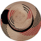 Artisan Wayuu straw hat in bohemian style with black and red accents and black trim

