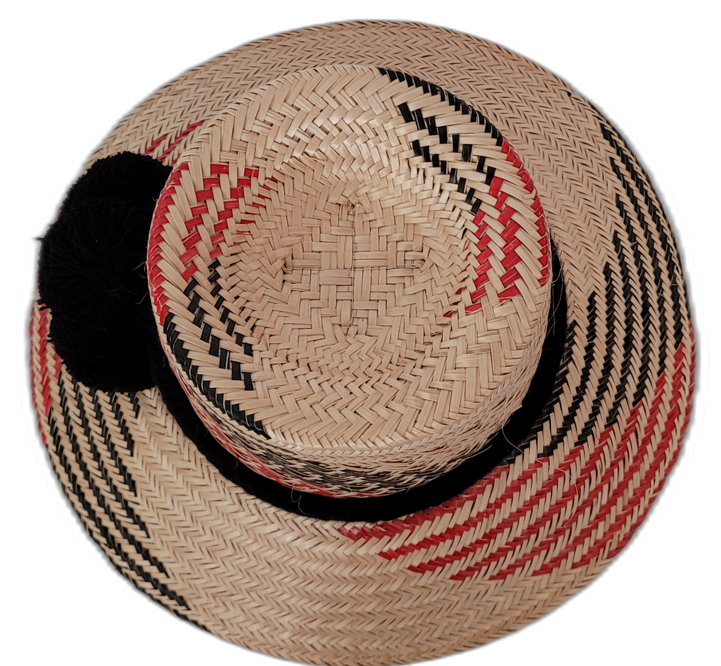 Artisan Wayuu straw hat in bohemian style with black and red accents and black trim

