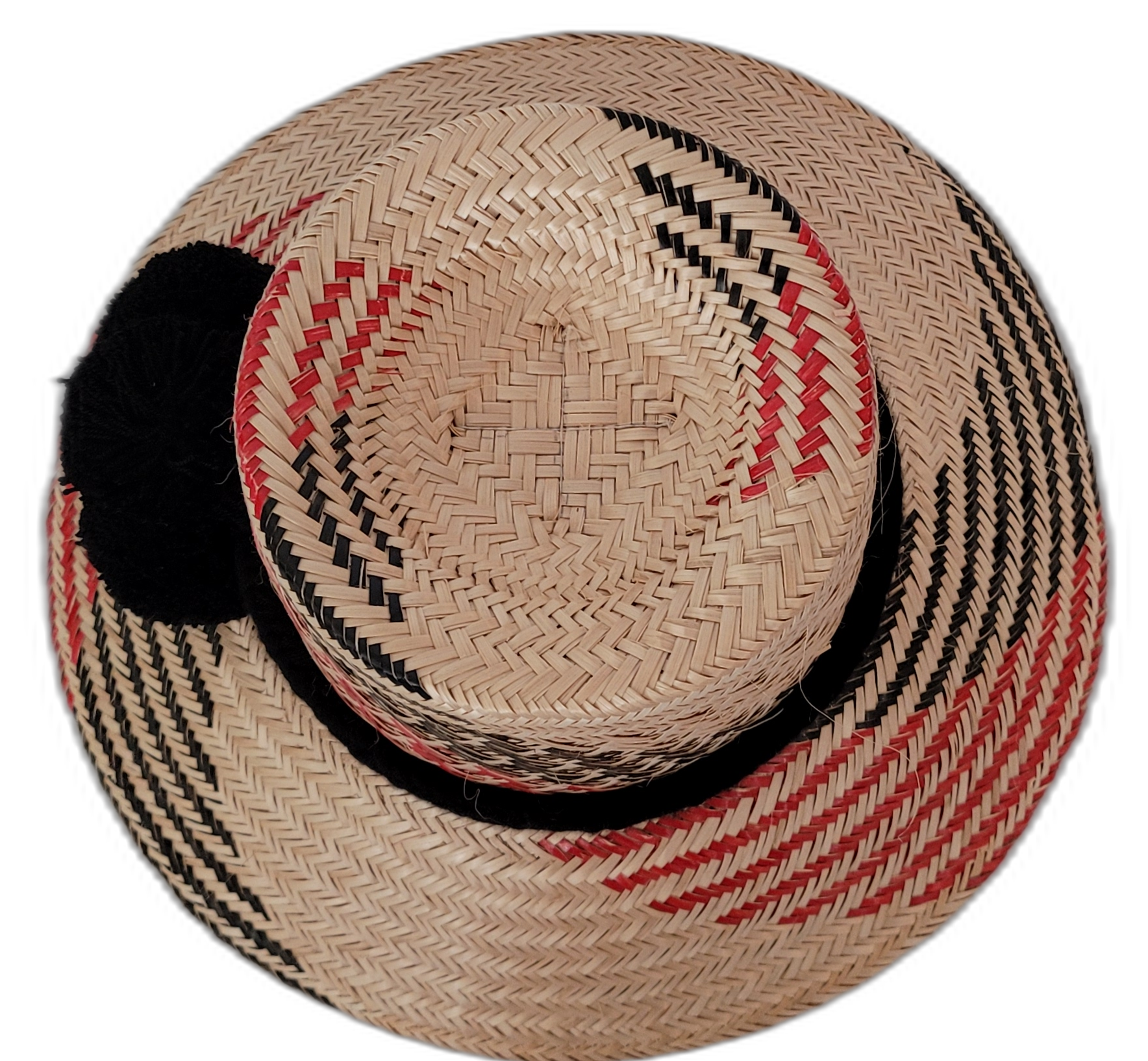 Artisan Wayuu straw hat in bohemian style with black and red accents and black trim

