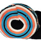 Vegan handmade Wayuu bag, black crochet design with coral and turquoise accents, crossbody strap, and black-and-white tassels, perfect for boho chic style.