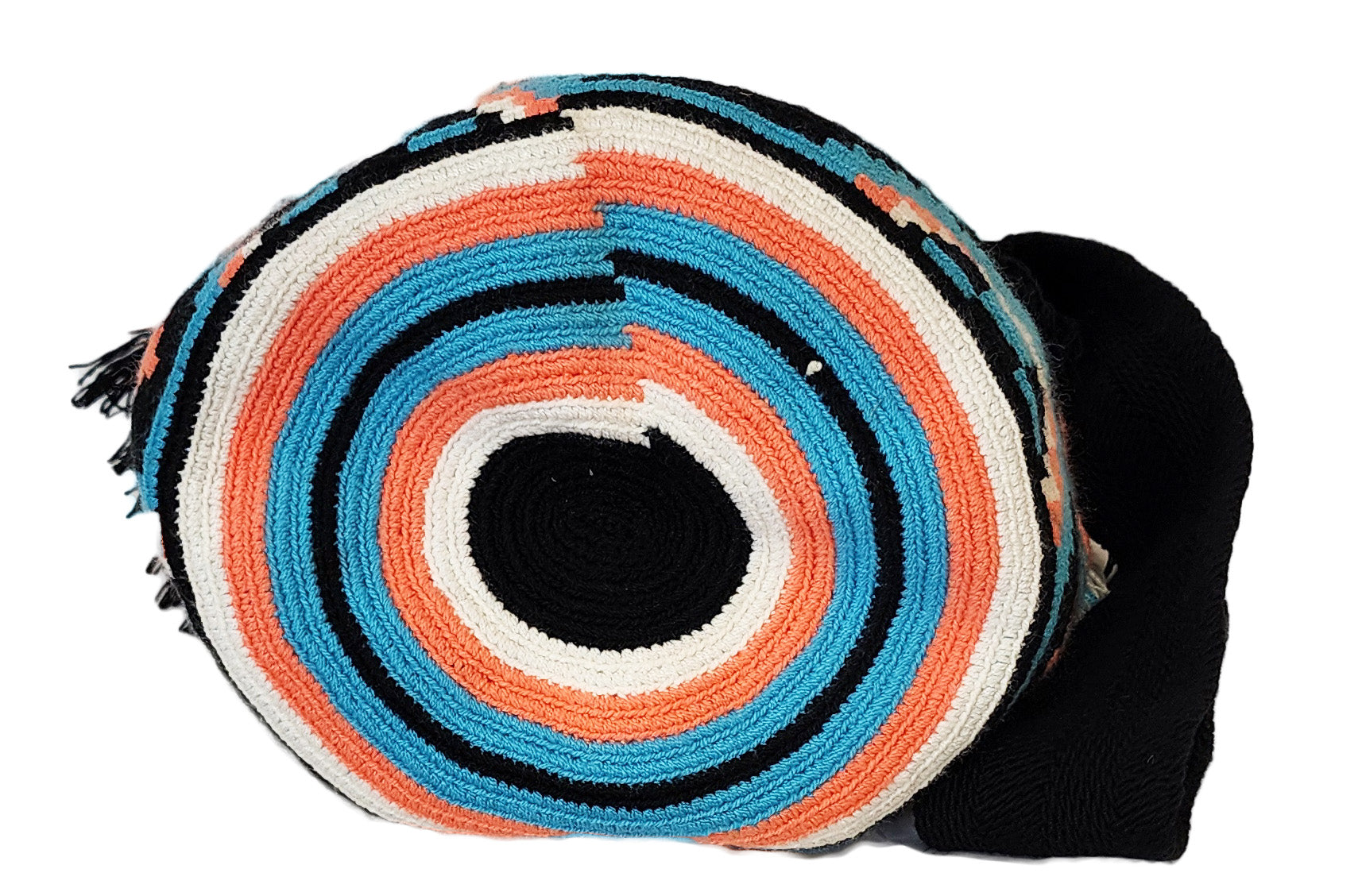 Vegan handmade Wayuu bag, black crochet design with coral and turquoise accents, crossbody strap, and black-and-white tassels, perfect for boho chic style.
