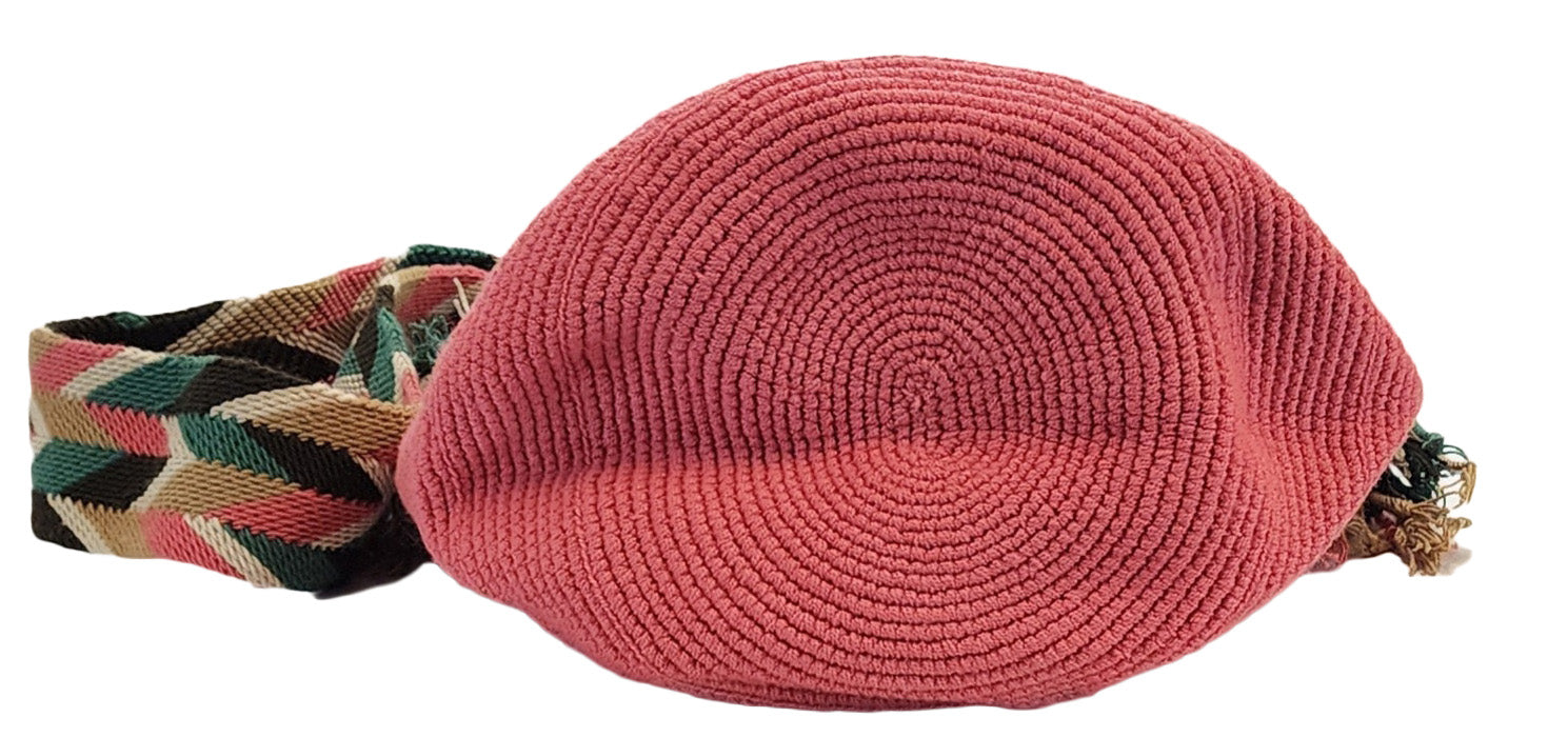 Vegan handmade Wayuu bag, coral crochet with floral motif lid, wide strap, and artisan tassels, perfect for boho chic fashion.
