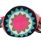 Vegan handmade Wayuu bag, pink and turquoise crochet design with bold multicolor tassels and crossbody strap, perfect for boho chic style.