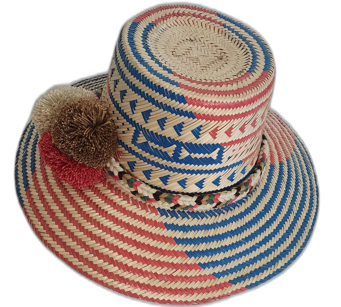 Artisan-crafted Wayuu hat featuring geometric weave and statement pompoms.