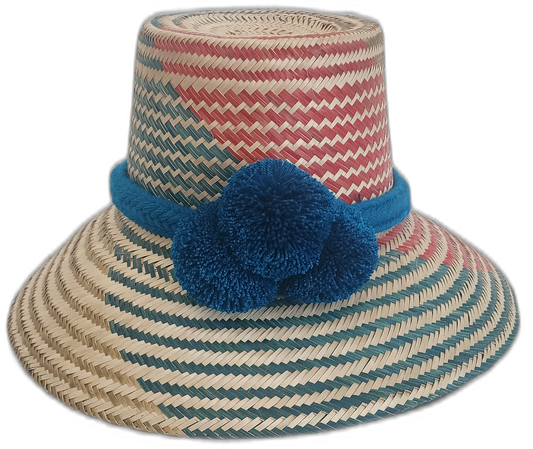 Boho straw hat with blue crown band and soft artisan red-blue patternpompoms