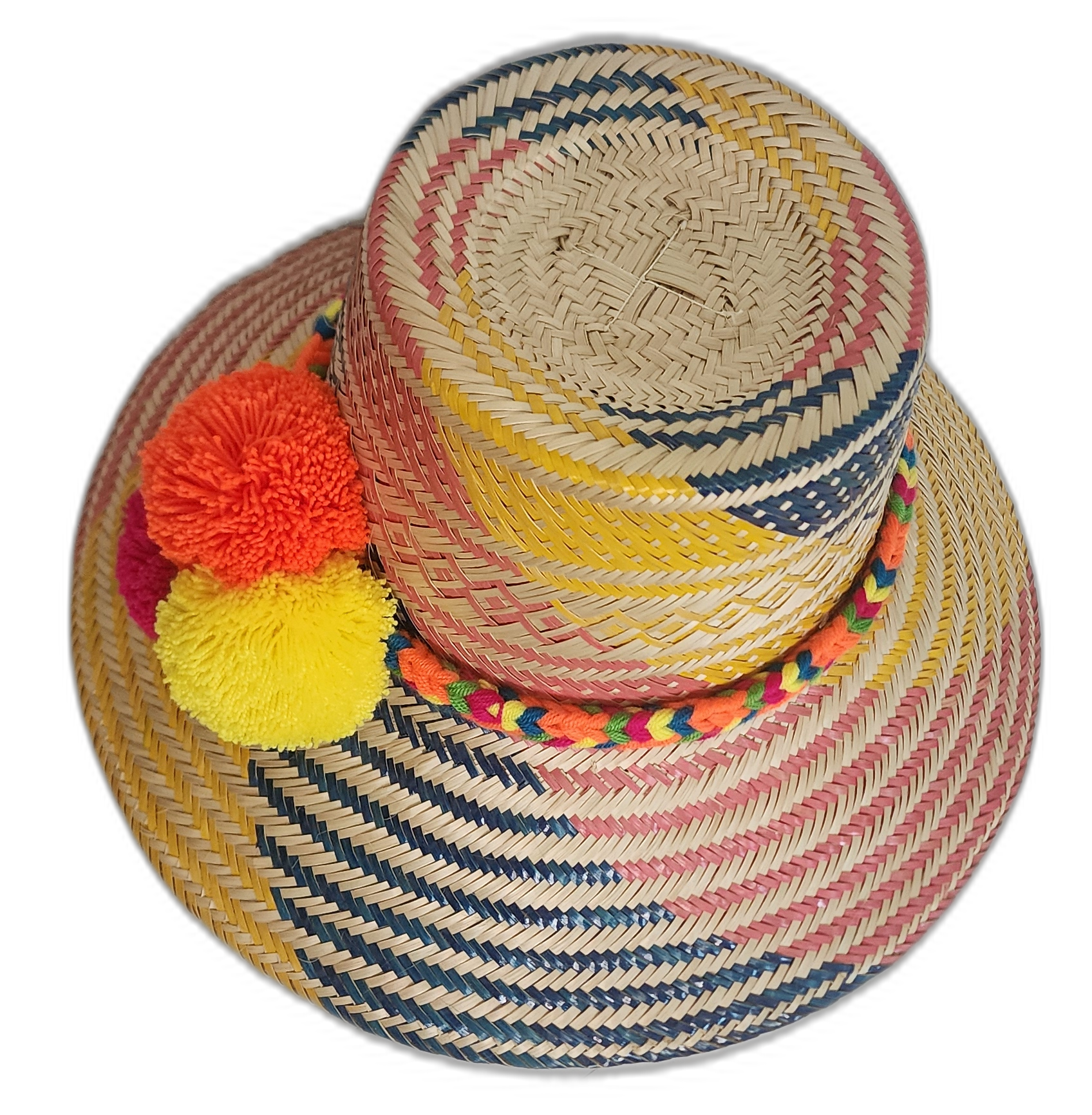 One-of-a-kind Wayuu straw hat with fuchsia, yellow, and orange pompoms on a bold pink-yellow design.