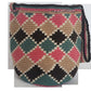 Boho chick crochet bag crafted by Wayuu artisans in a vibrant palette