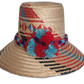 Handmade Wayuu straw hat with red and blue woven design and pompoms