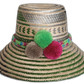 Handmade Wayuu hat with green and magenta pompoms in boho style