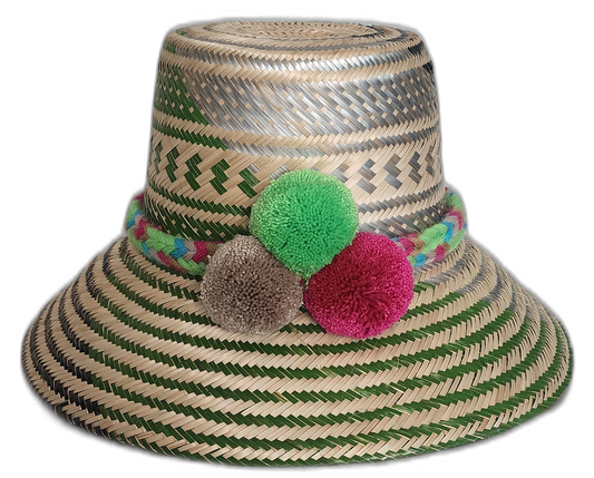 Handmade Wayuu hat with green and magenta pompoms in boho style