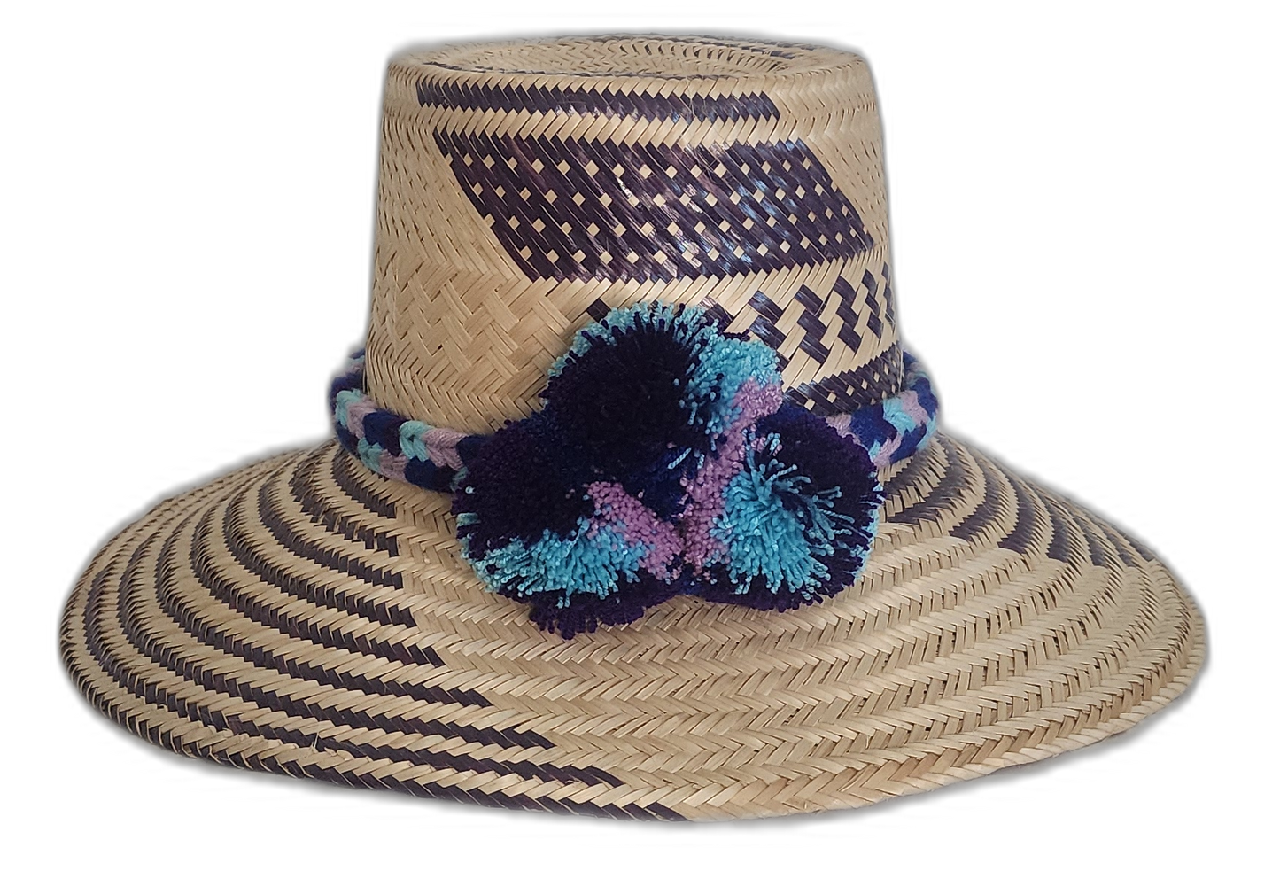 Handmade Wayuu straw hat with indigo, turquoise, and lilac pompoms