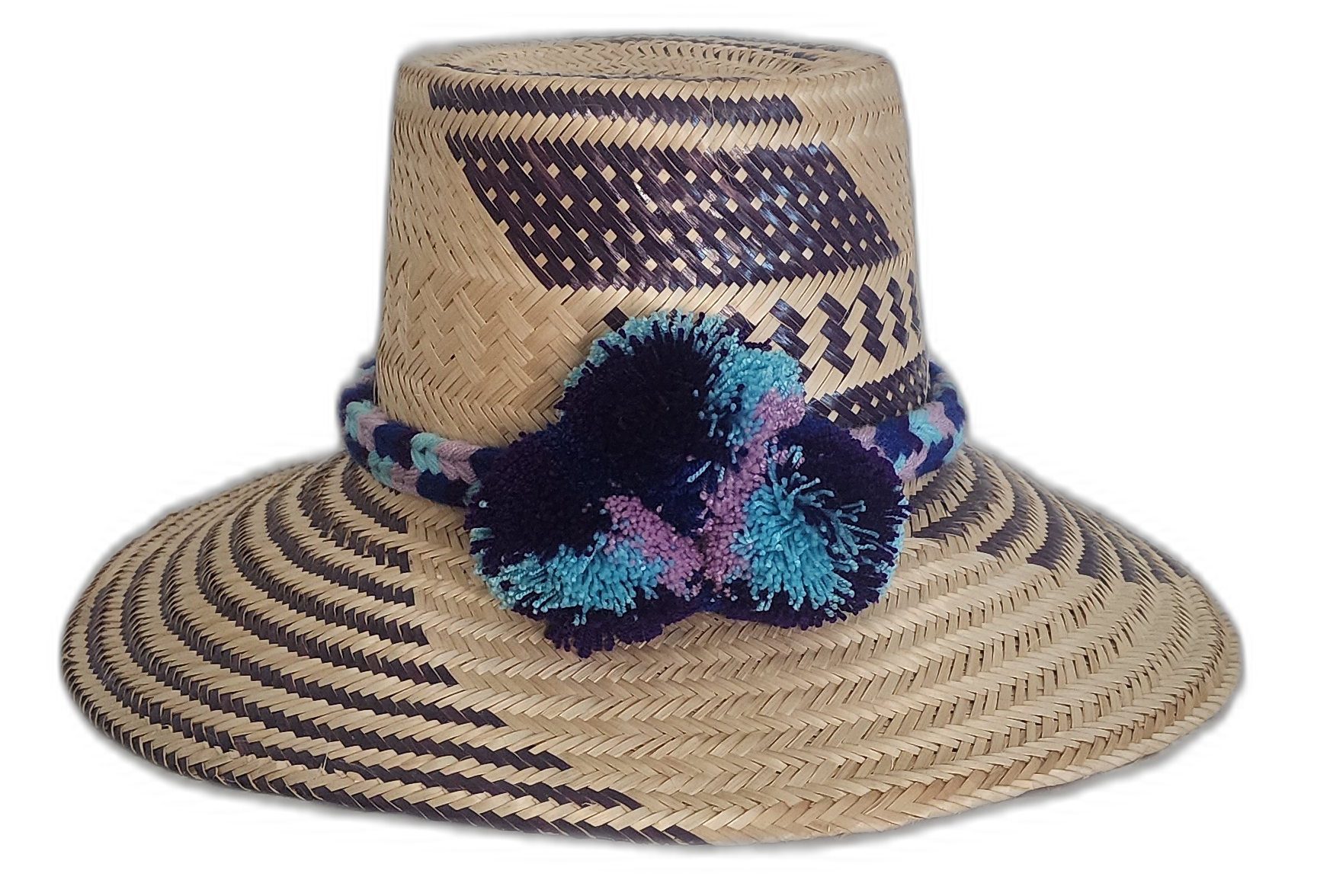 Handmade Wayuu straw hat with indigo, turquoise, and lilac pompoms