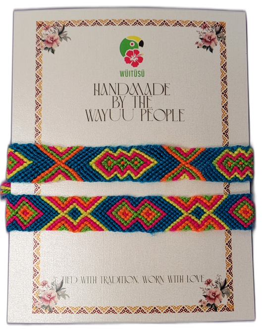 Handmade Wayuu friendship bracelets in bright blue with multicolor patterns.