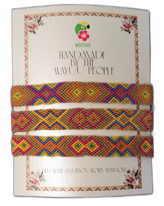 Handmade Wayuu friendship bracelets in brown and multicolor patterns.