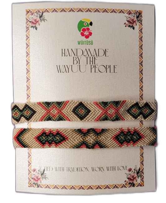 Handmade Wayuu friendship bracelets in earthy tones with tribal patterns.