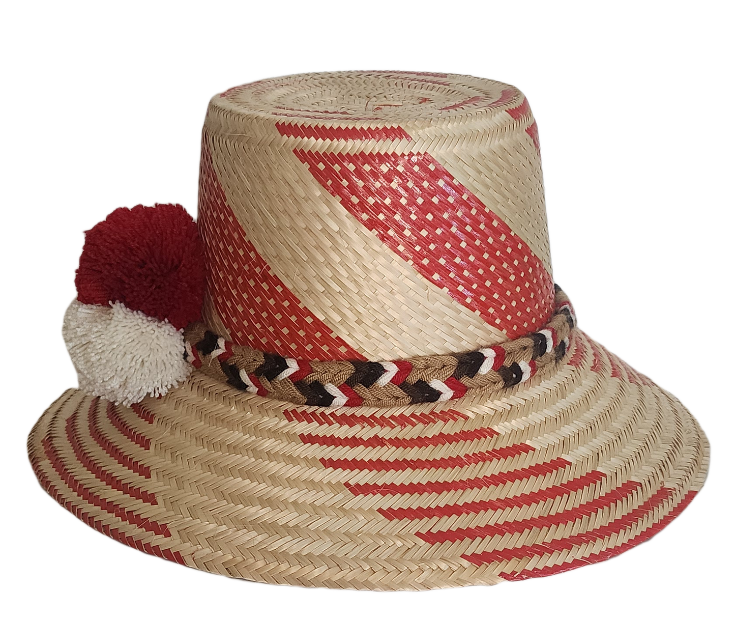 Boho chick hat woven from Iraca palm with red diagonal accents and pompom trim handmade by Wayuu artisans.