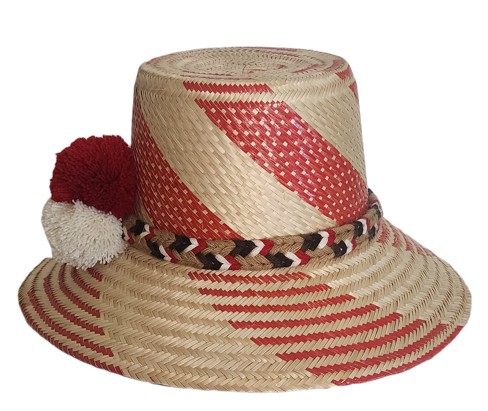 Boho chick hat woven from Iraca palm with red diagonal accents and pompom trim handmade by Wayuu artisans.