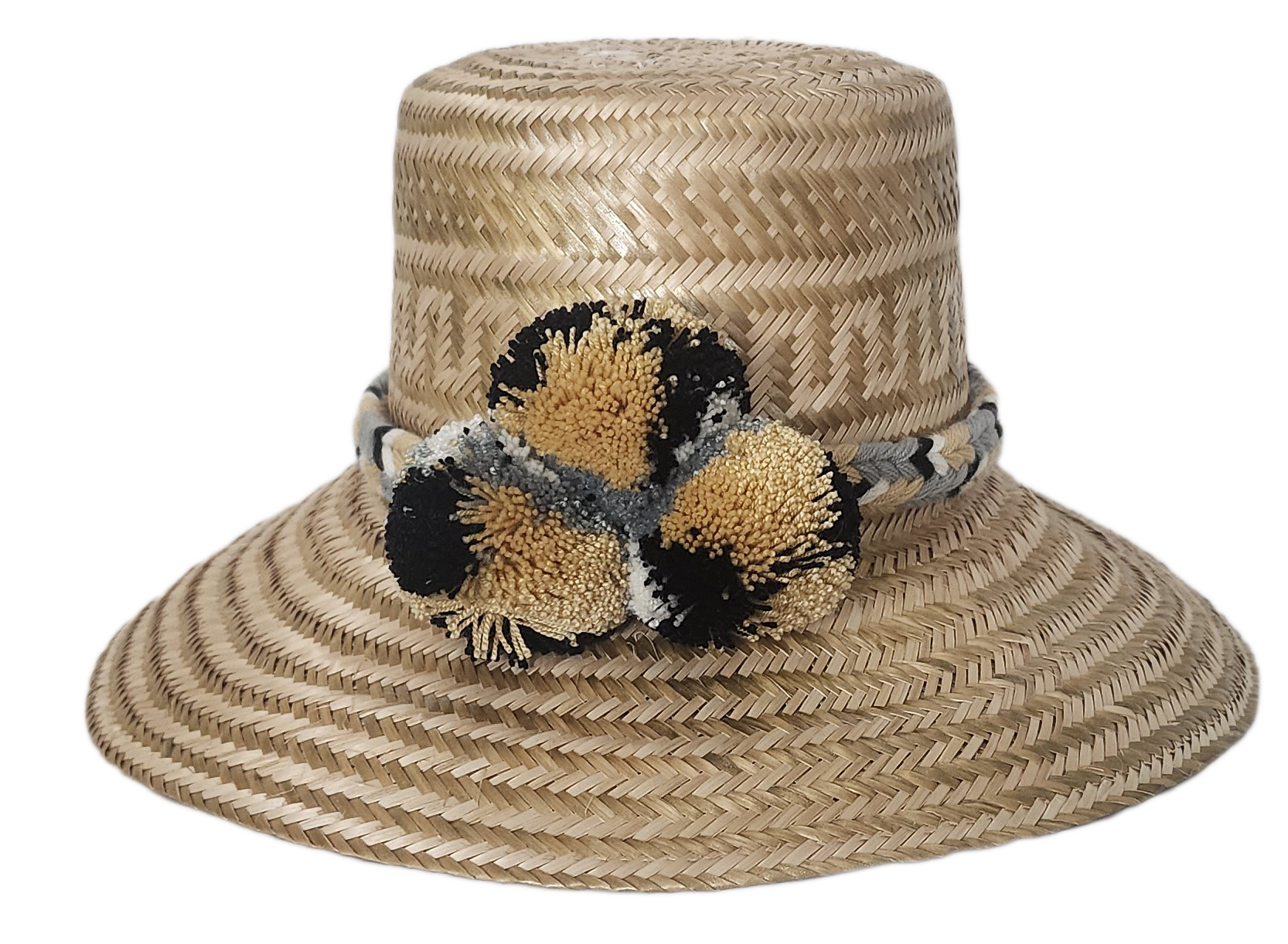 Fashion accessory hat handcrafted by Wayuu artisans from Iraca palm.

