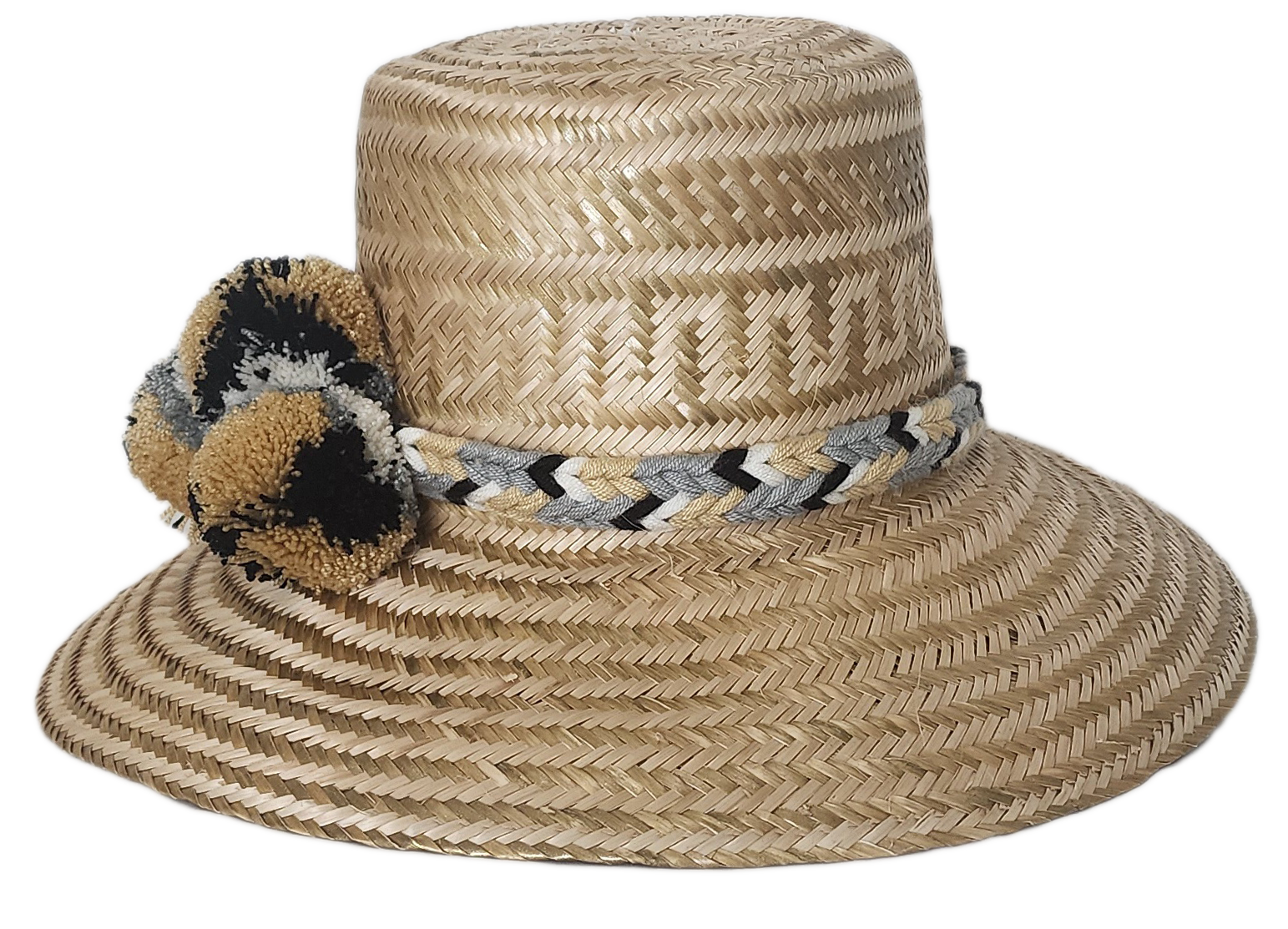 Fashion accessory hat handcrafted by Wayuu artisans from Iraca palm.
