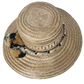 Fashion accessory hat handcrafted by Wayuu artisans from Iraca palm.
