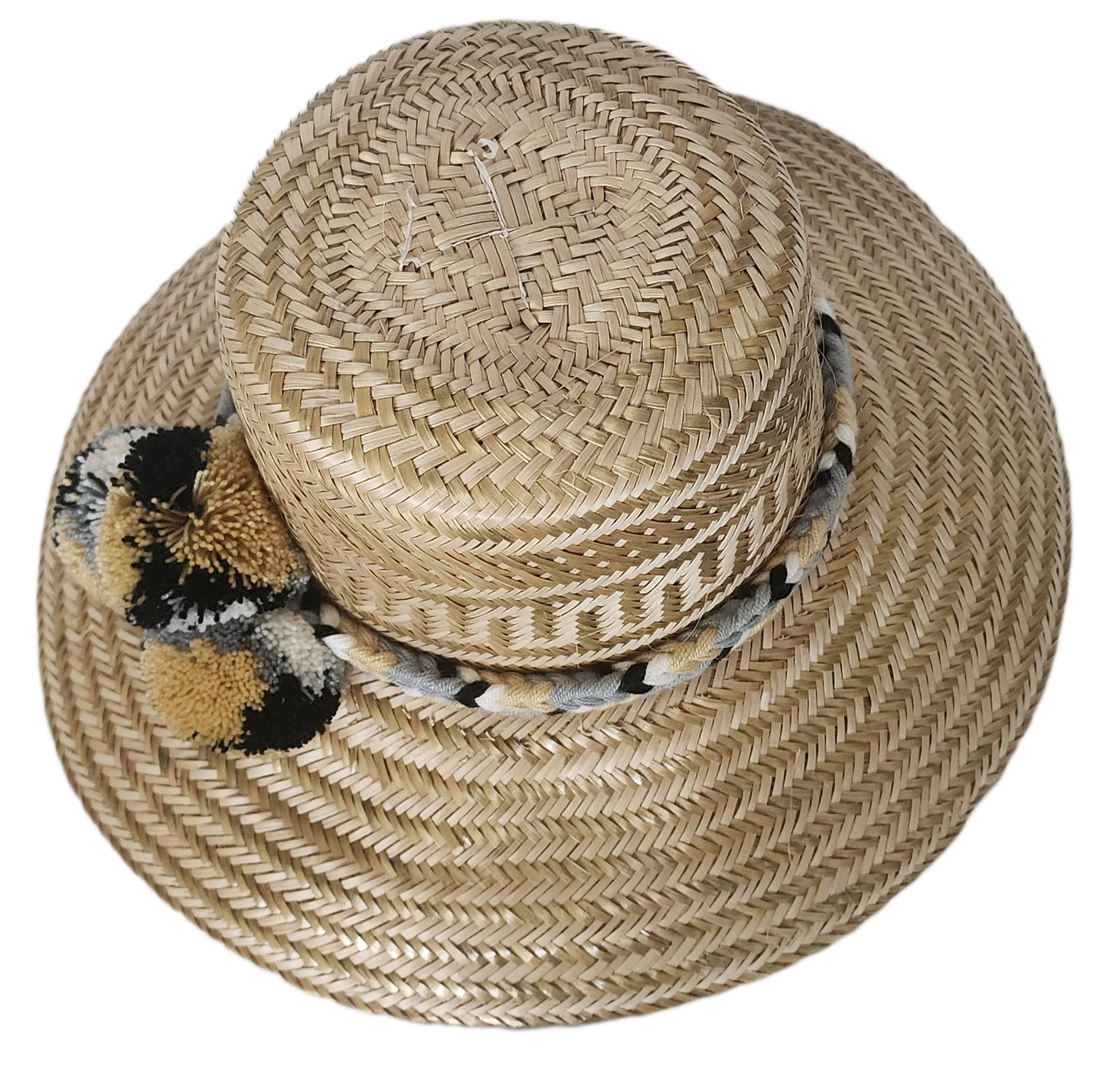 Fashion accessory hat handcrafted by Wayuu artisans from Iraca palm.
