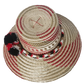 Stylish beach hat handcrafted by Wayuu artisans from Iraca palm.
