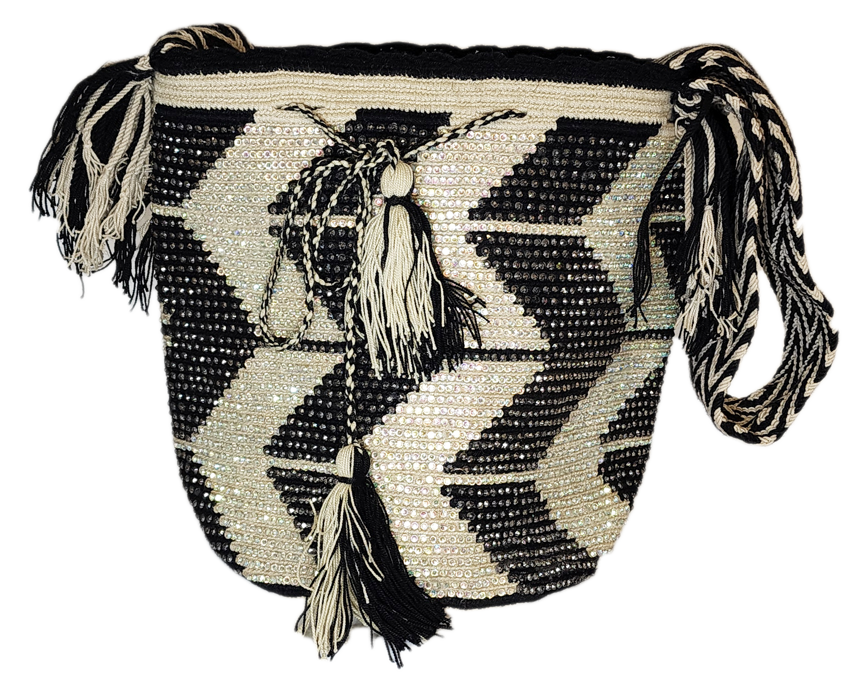 Boho chick bag featuring monochrome zigzag patterns and tassel accents.